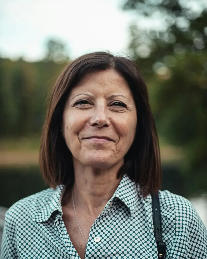 Smiling woman with natural expression lines