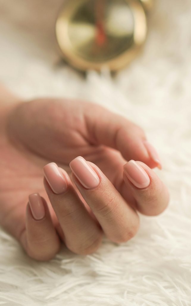 Hand with neatly kept natural nails