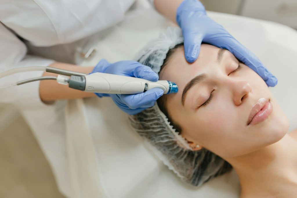 Facial treatment with a handheld device