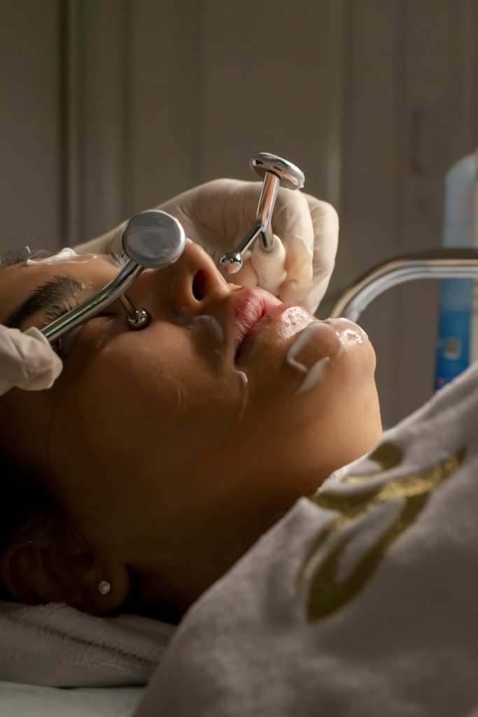 Facial skin treatment with metal tools