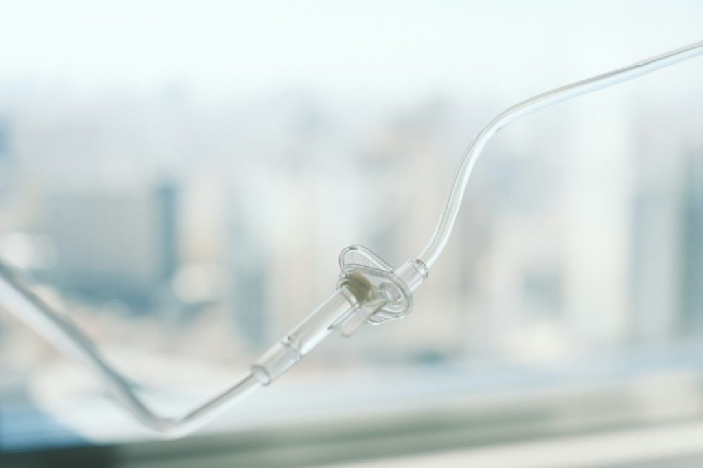 IV drip line against a blurred background