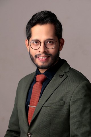 Dr. Omkar Warang